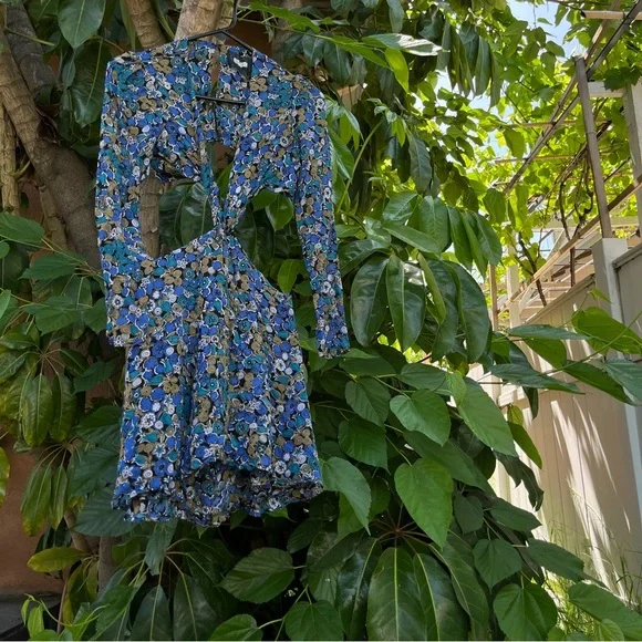 Reformation floral long sleeve dress with cut outs!